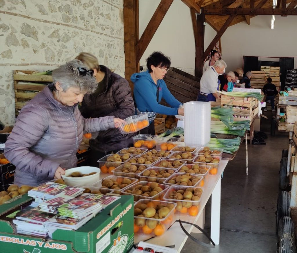 Stand au téléthon de Sainte Bazeille lors de la vente de fruits et légumes